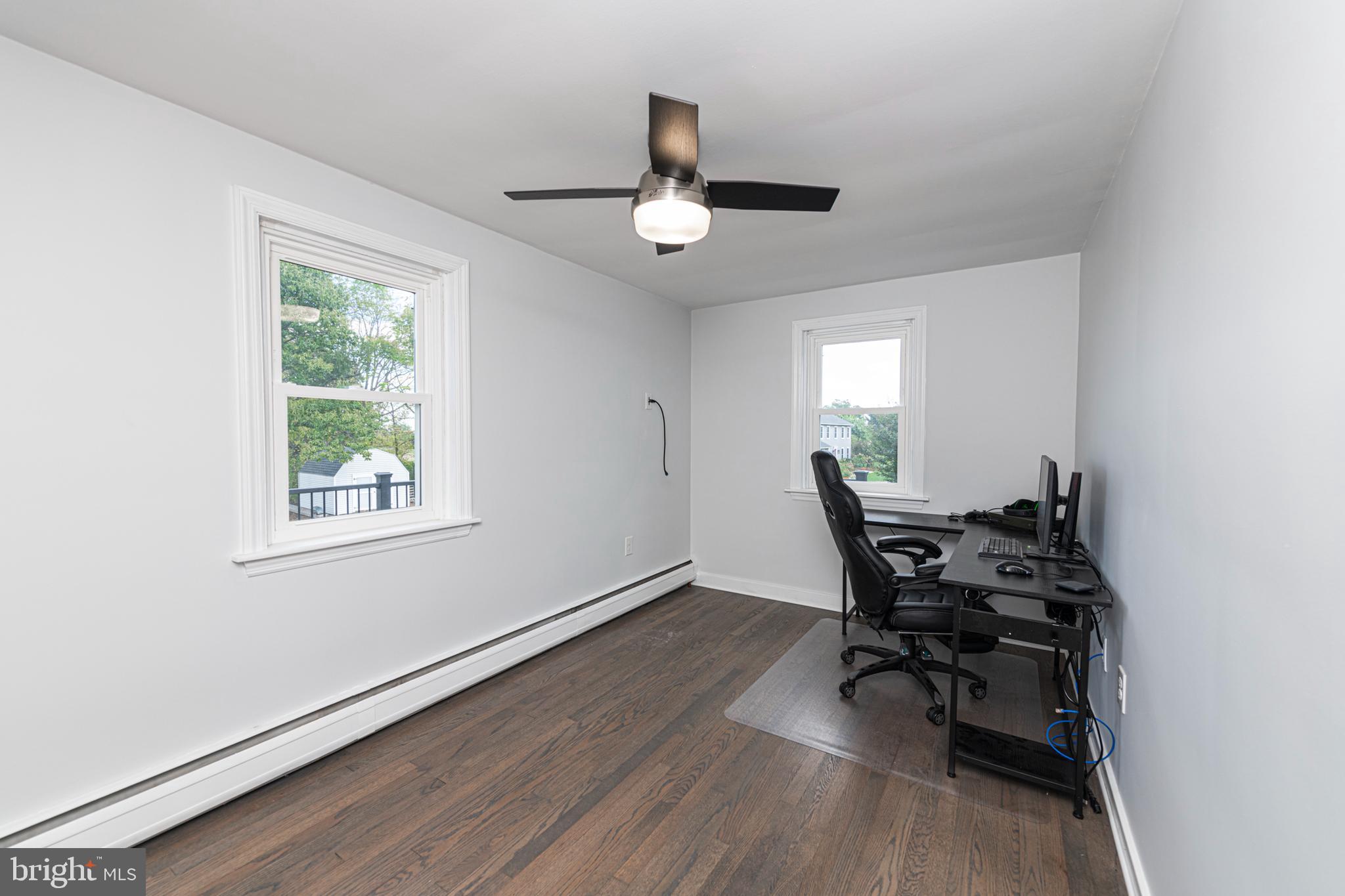 51 Keen Road Spring City, PA 19475 - Photo 23 of 32 a view of a workspace with wooden floor and a window