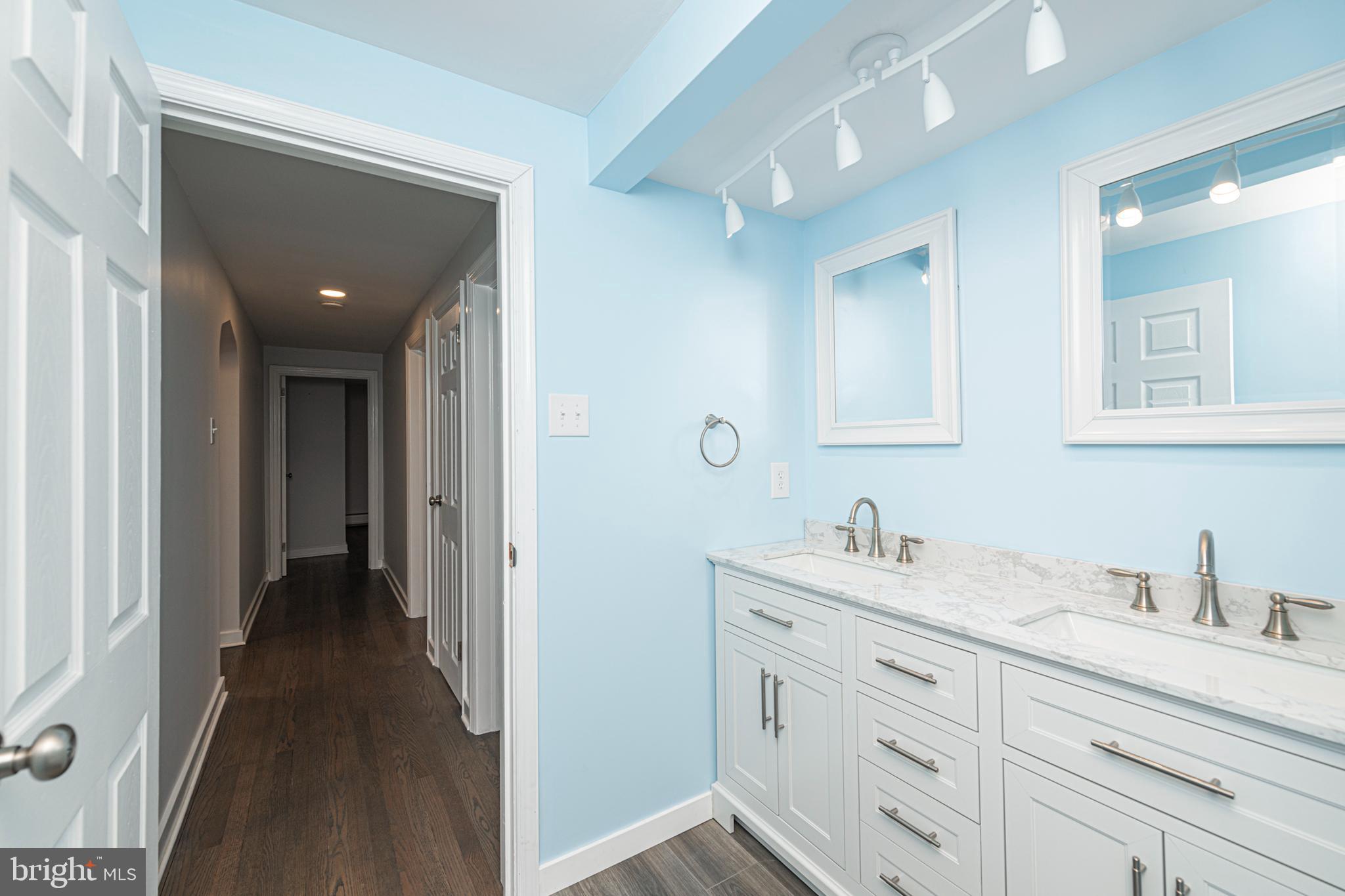 51 Keen Road Spring City, PA 19475 - Photo 25 of 32 a en suite bathroom with a sink and a mirror