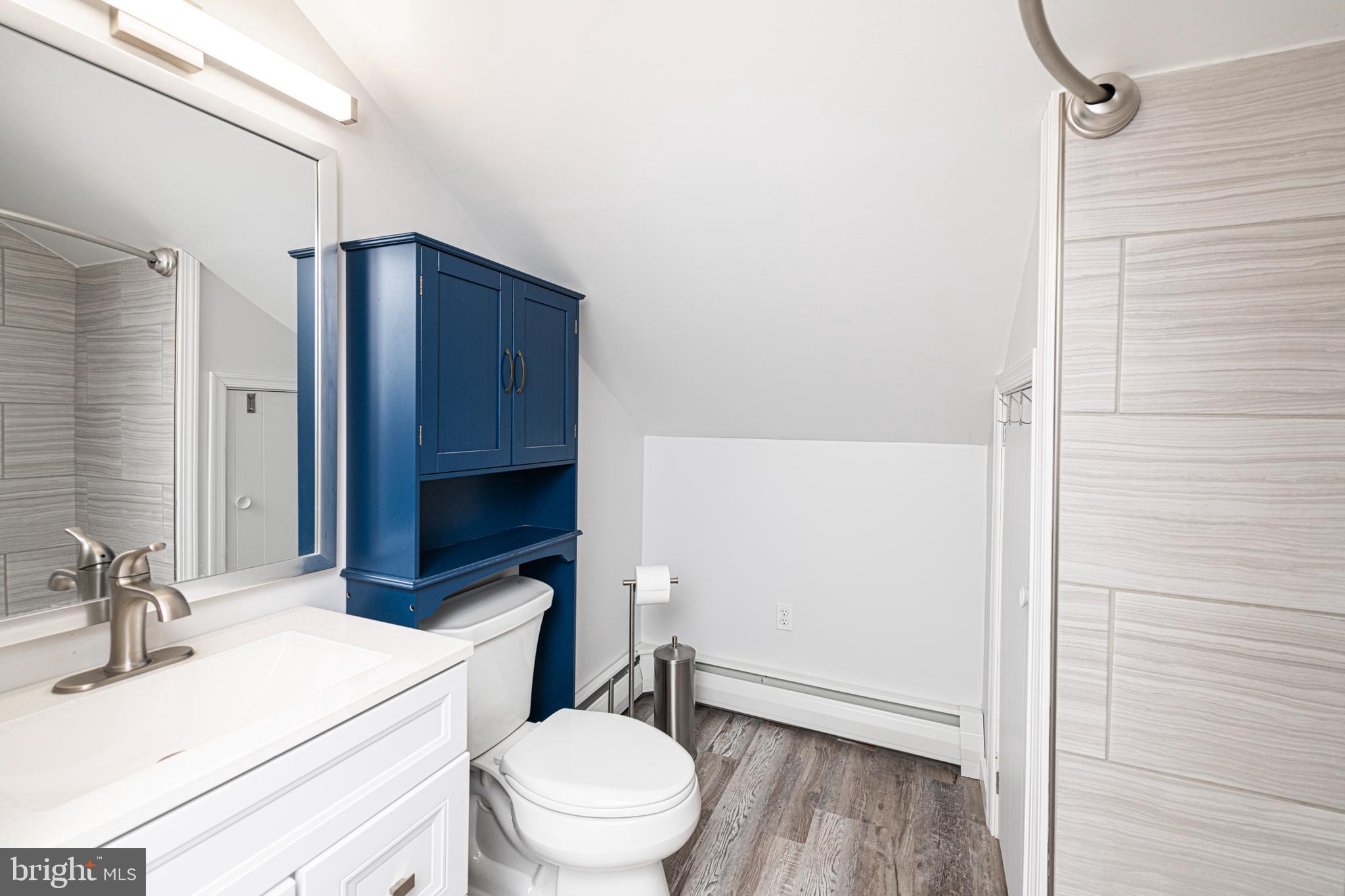 51 Keen Road Spring City, PA 19475 - Photo 28 of 32 a bathroom with a sink a toilet a mirror and shower