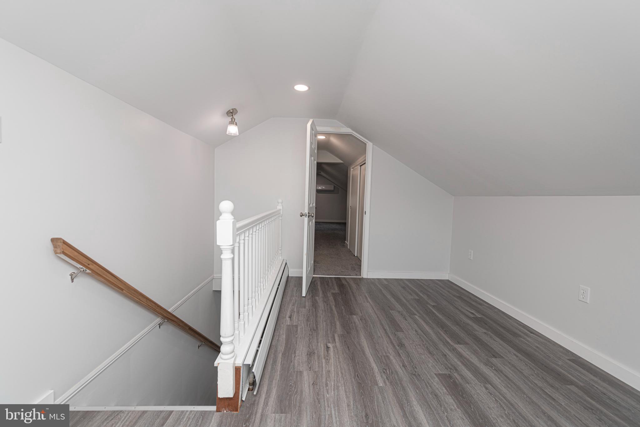 51 Keen Road Spring City, PA 19475 - Photo 31 of 32 a view of hallway with stairs and wooden floor