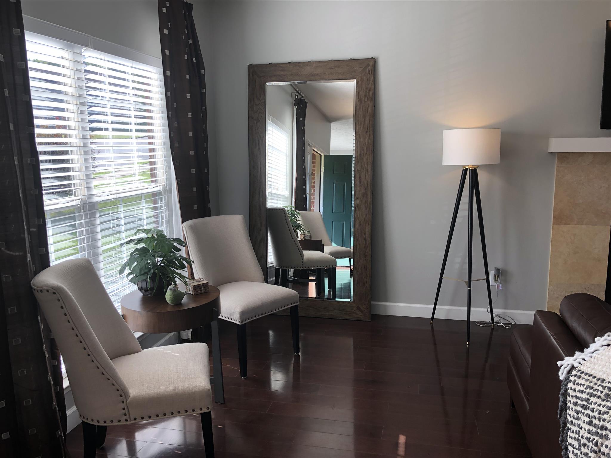 7064 Red Apple Road Antioch, TN 37013 - Photo 5 of 26 a living room with furniture and a wooden floor
