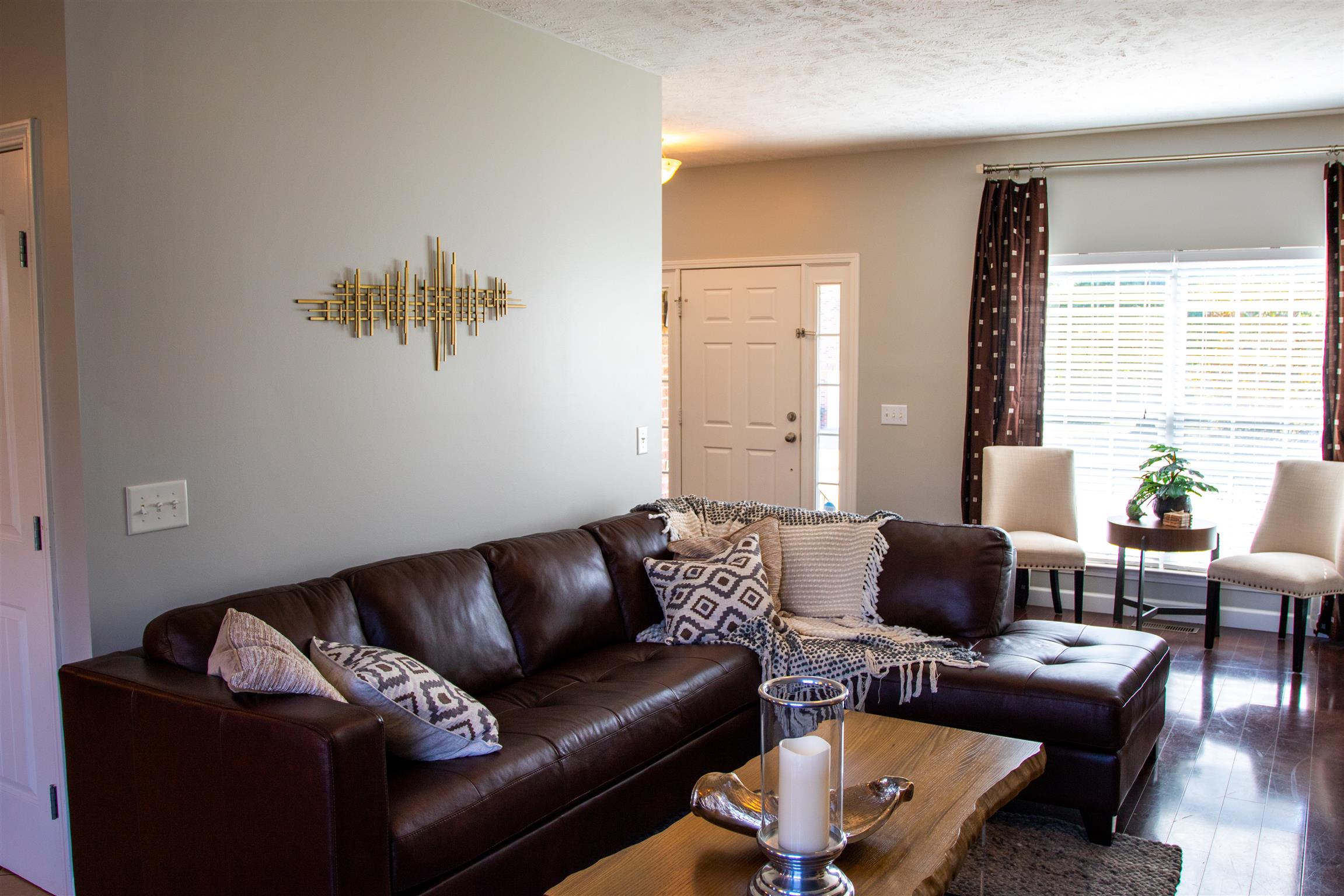 7064 Red Apple Road Antioch, TN 37013 - Photo 6 of 26 a living room with furniture and wooden floor