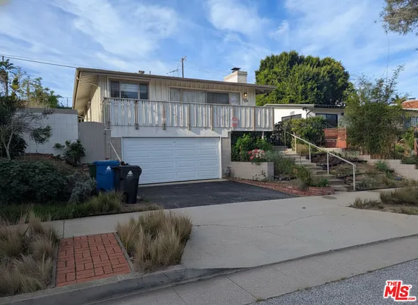a view of a house with a patio