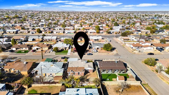 an aerial view of a city with lots of residential buildings