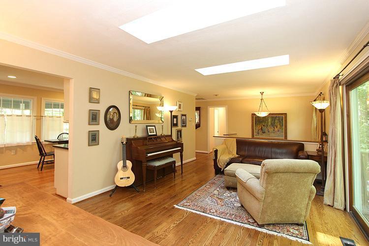 11327 Myrtle Lane Reston, VA 20191 - Photo 22 of 30 a living room with furniture and a large window