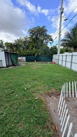 a view of a yard with an outdoor space