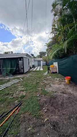 a view of outdoor space and yard
