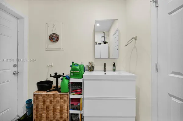 a kitchen with stainless steel appliances granite countertop a stove microwave and refrigerator