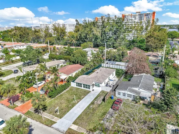 a view of city with ocean