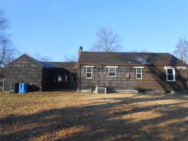 79 Fox Hill Road Springfield, MA 01118 - Photo 2 of 9 a front view of a house with a yard