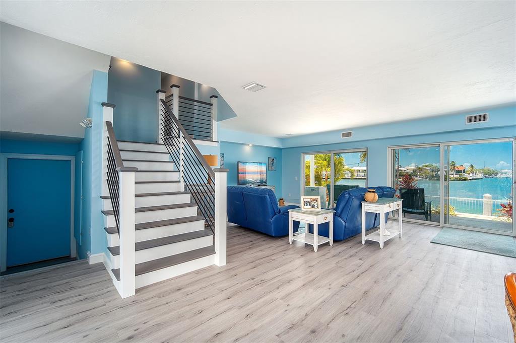 770 9th Street Key Colony Beach, FL 33051 - Photo 4 of 39 a view of a livingroom with furniture and wooden floor