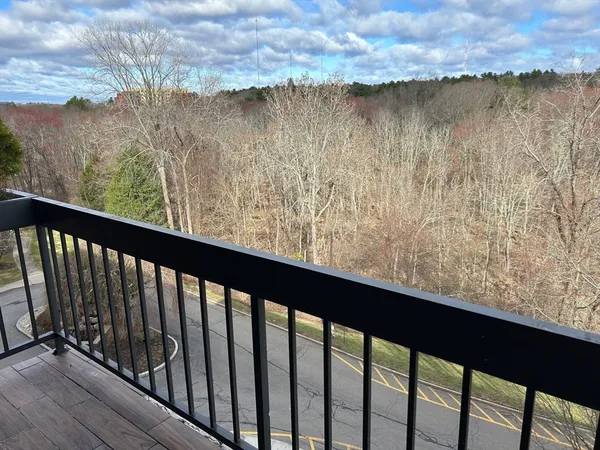 a view of a lake from a balcony