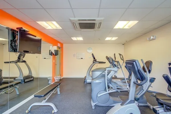a view of a room with gym equipment