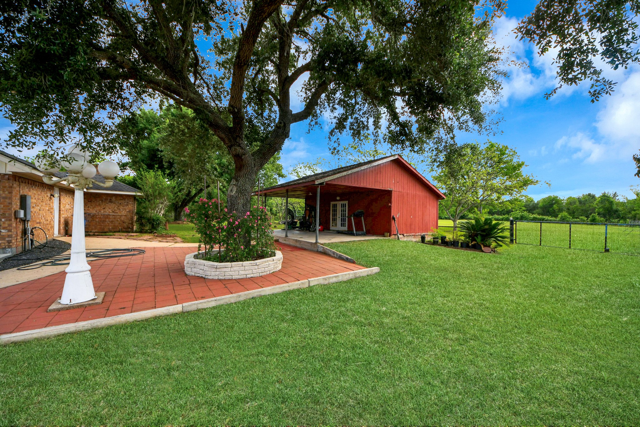 8407 Kirchner Road Manvel, TX 77578 - Photo 30 of 36 Backyard - Red outdoor storage is not included