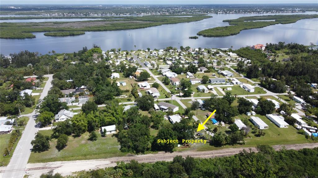 1605 Griffith Avenue Punta Gorda, FL 33982 - Photo 2 of 4 a view of a lake with a city