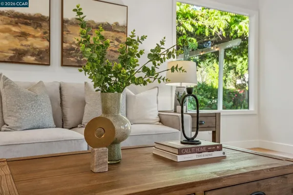 a workspace with furniture and a window