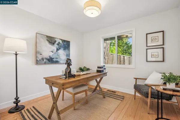 a view of a workspace with furniture