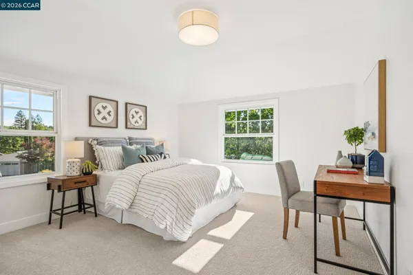 an aerial view of a house with mountain view
