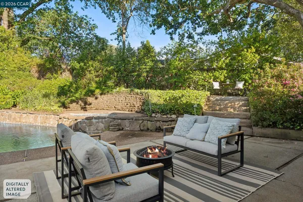 a view of an outdoor space with furniture