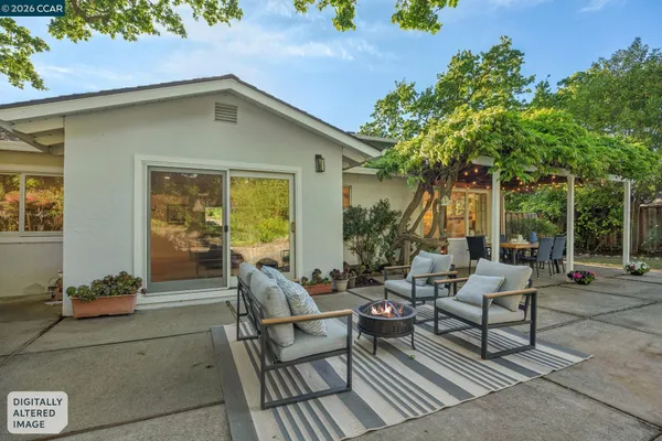 a view of a backyard with plants