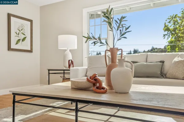 a living room with furniture and a table