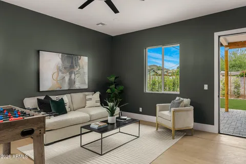 a living room with furniture and a window