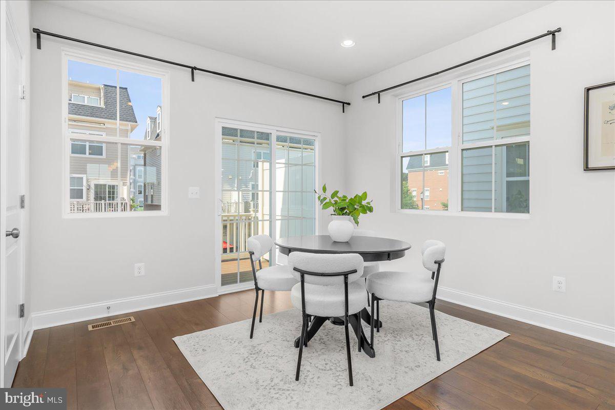 521 East 7th Street Frederick, MD 21701 - Photo 6 of 44 Dining Area with Slider to Deck