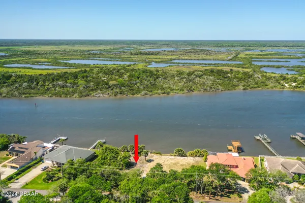 a view of a lake with a houses