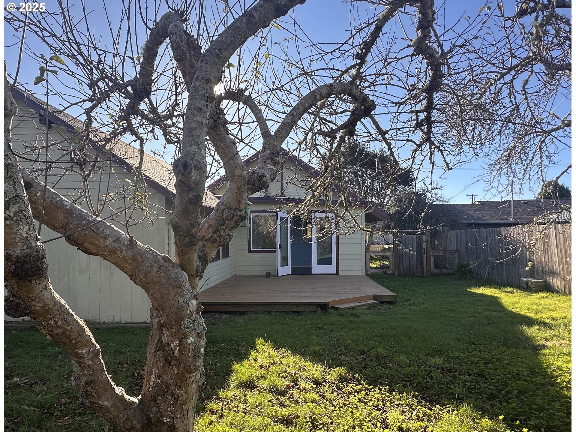 1335 7th Street Florence, OR 97439 - Photo 27 of 39 a front view of a house with garden