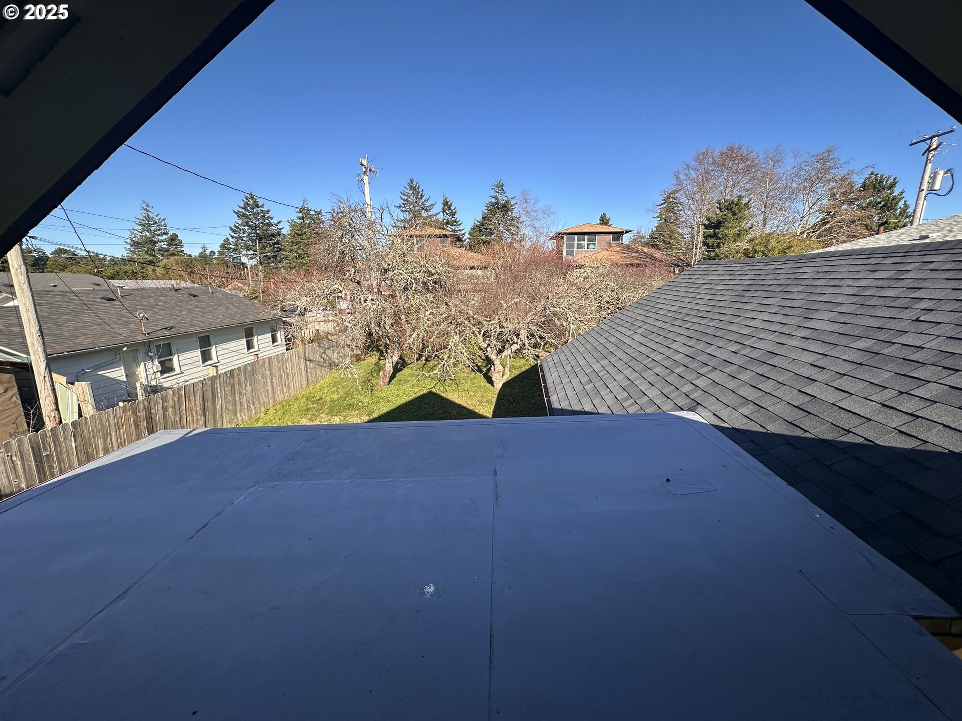 1335 7th Street Florence, OR 97439 - Photo 35 of 39 a view of a balcony with an outdoor space and seating area