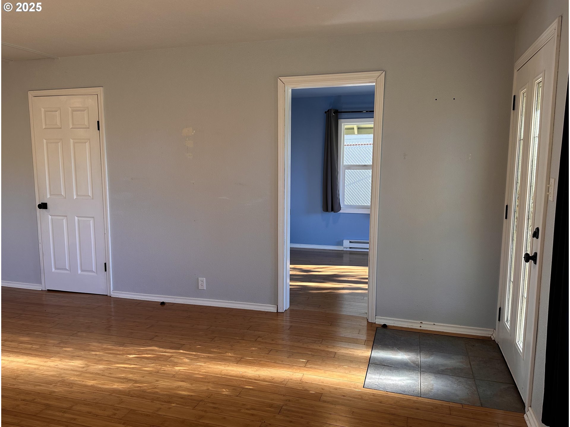 1335 7th Street Florence, OR 97439 - Photo 7 of 39 a view of empty room with wooden floor