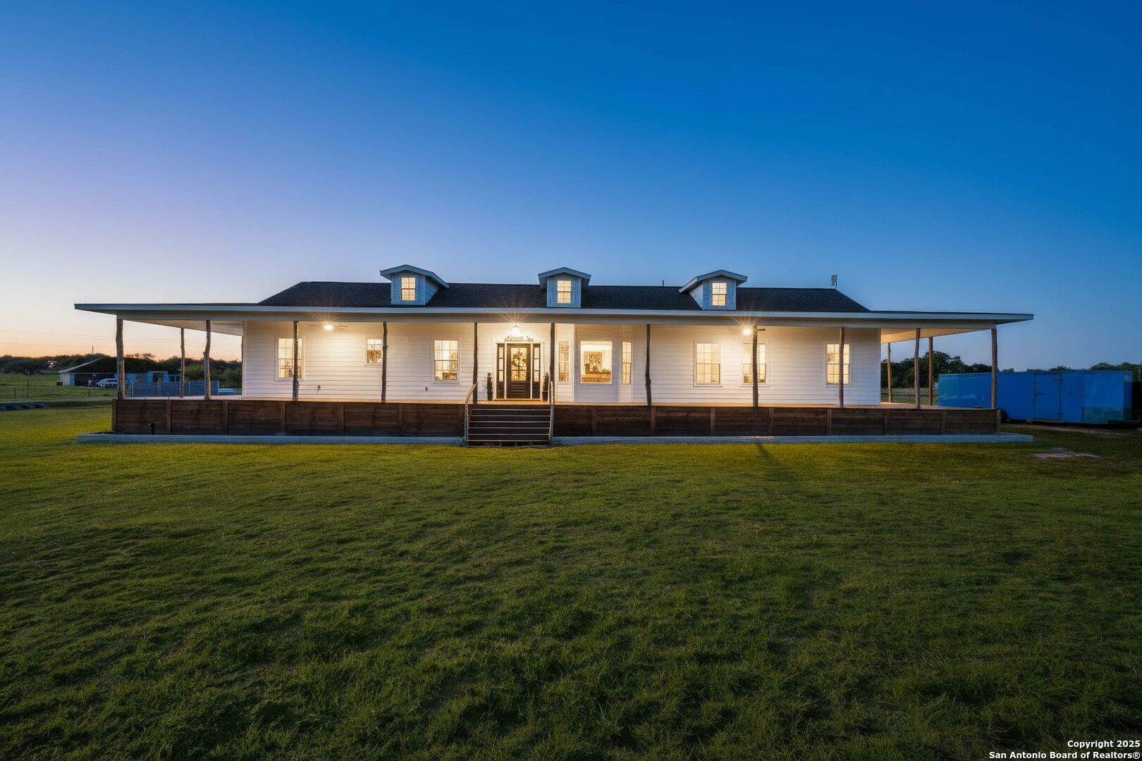 a front view of house with outdoor space and garden