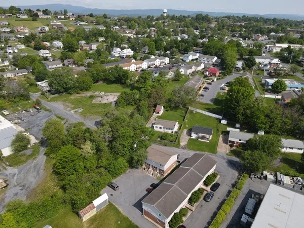 an aerial view of a city with lots of residential buildings