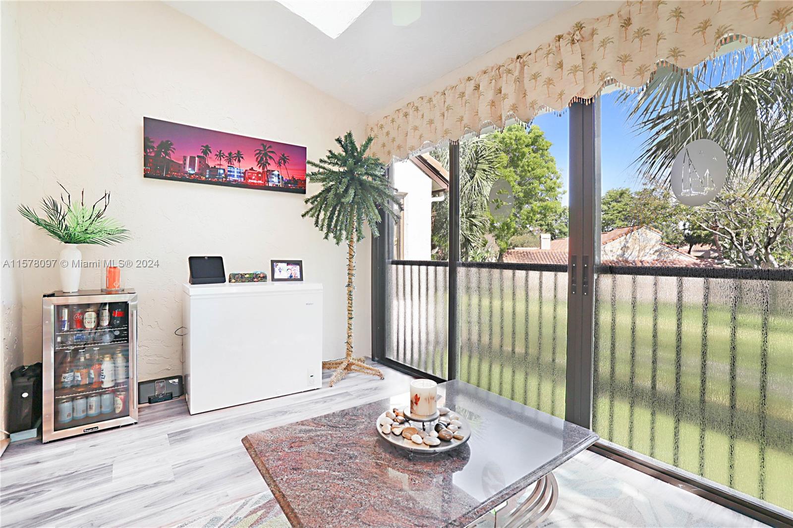 7864 Granada Place, Unit 504 Boca Raton, FL 33433 - Photo 28 of 65 a view of a dining room with a table and chairs
