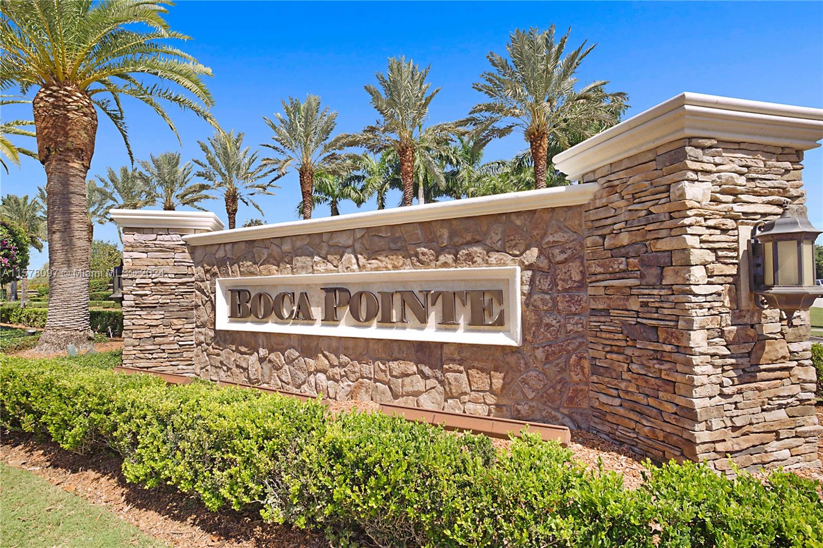 7864 Granada Place, Unit 504 Boca Raton, FL 33433 - Photo 51 of 65 a front view of a house with a garden