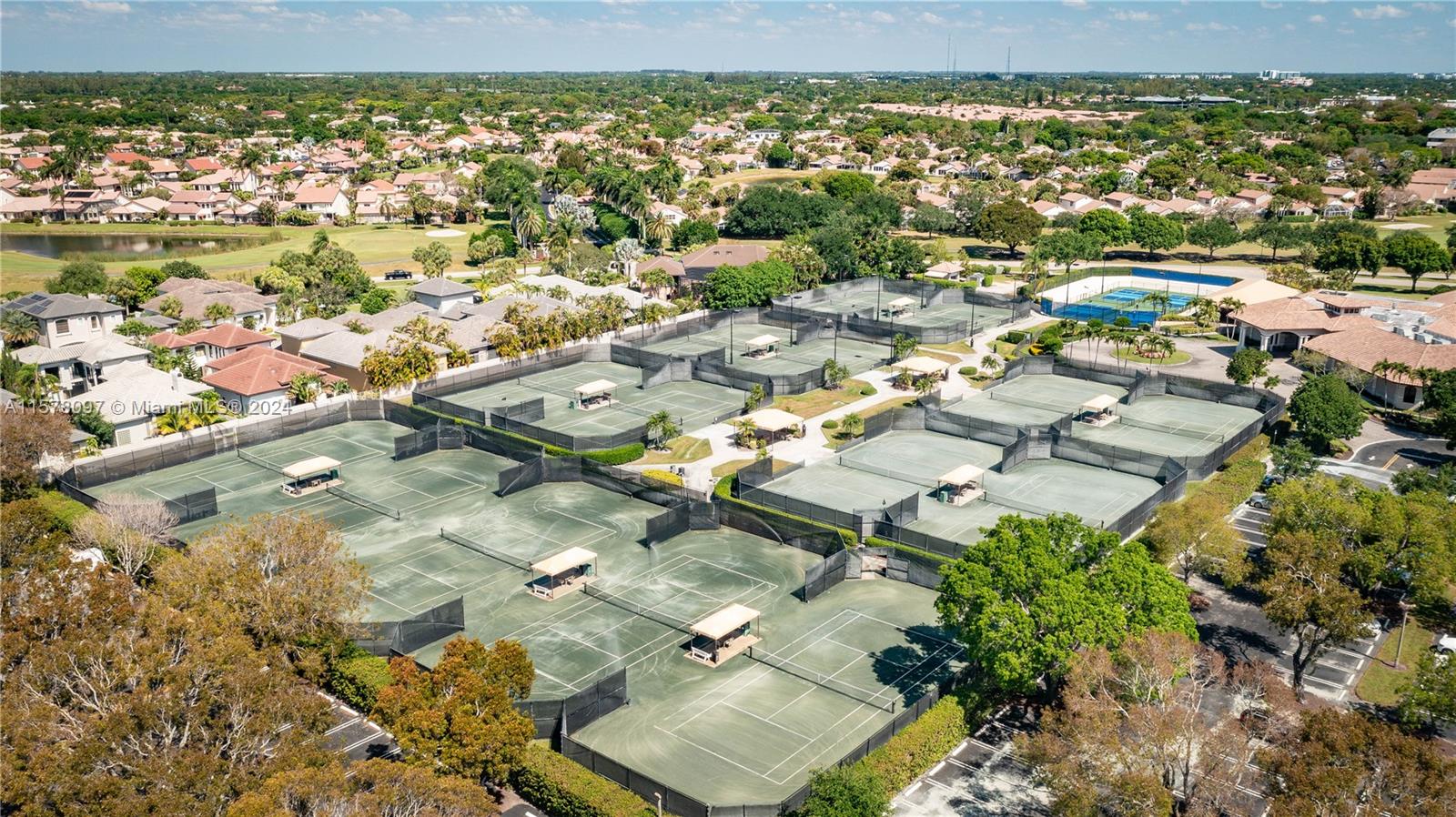 7864 Granada Place, Unit 504 Boca Raton, FL 33433 - Photo 56 of 65 an aerial view of residential houses with outdoor space