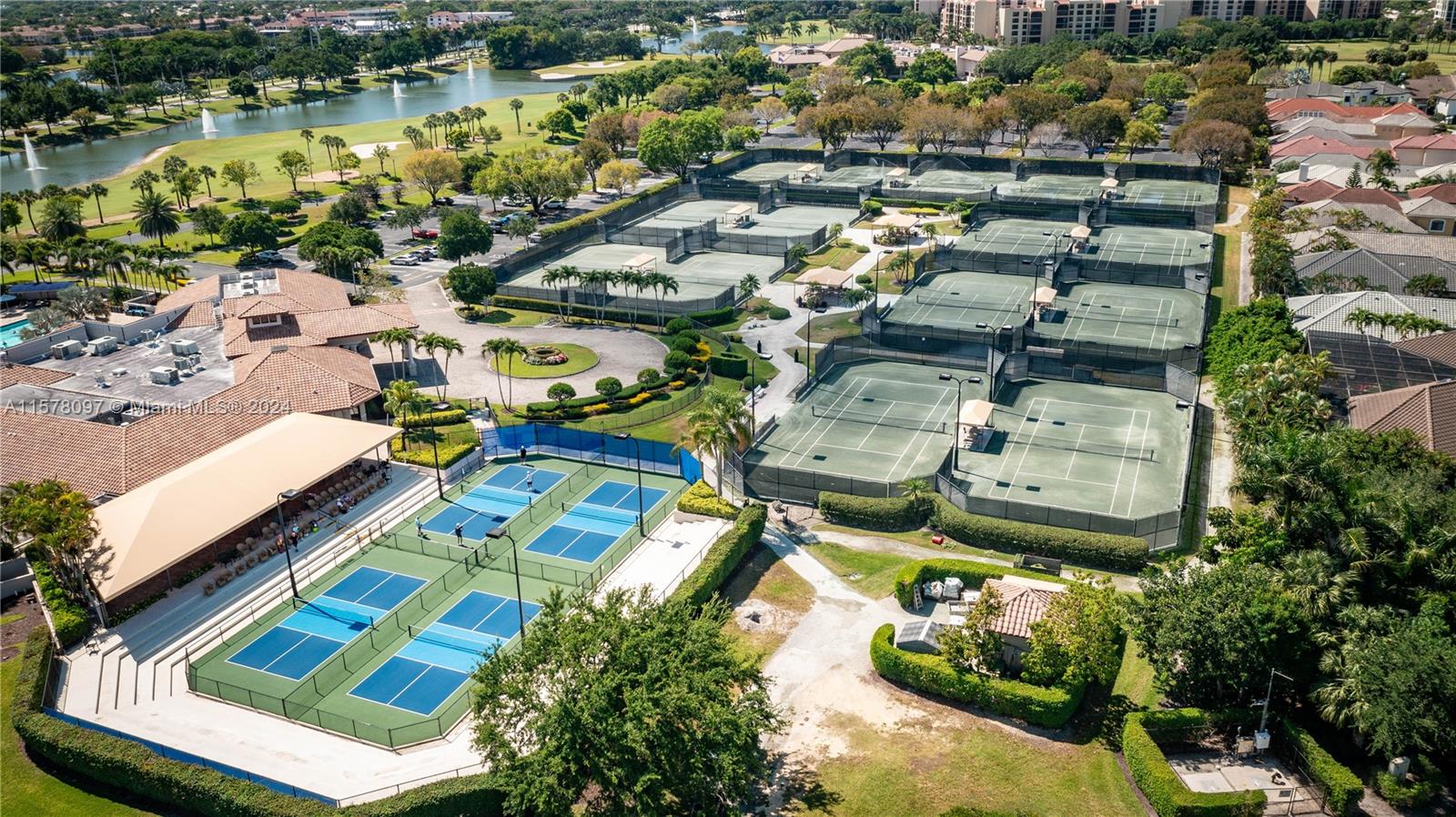 7864 Granada Place, Unit 504 Boca Raton, FL 33433 - Photo 59 of 65 an aerial view of residential houses with outdoor space