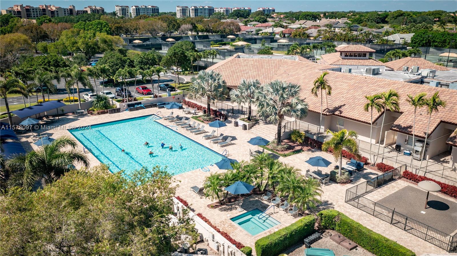 7864 Granada Place, Unit 504 Boca Raton, FL 33433 - Photo 61 of 65 an aerial view of a city with lots of residential buildings
