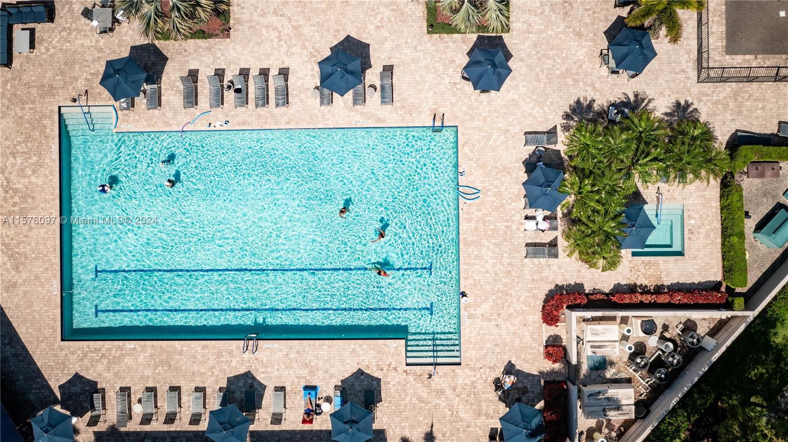 7864 Granada Place, Unit 504 Boca Raton, FL 33433 - Photo 63 of 65 an aerial view of a house with a yard