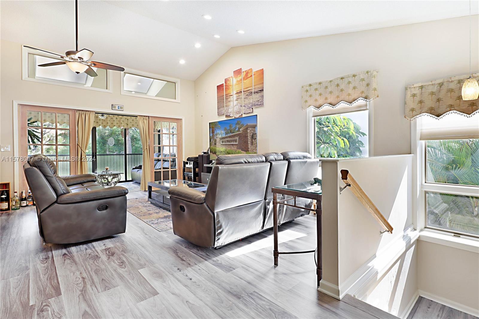 7864 Granada Place, Unit 504 Boca Raton, FL 33433 - Photo 8 of 65 a living room with furniture and a wooden floor