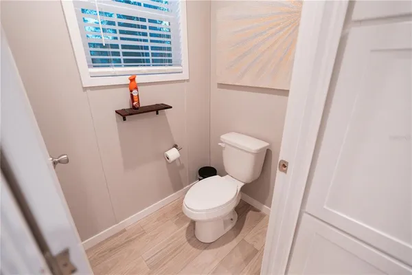 a bathroom with a toilet and a sink