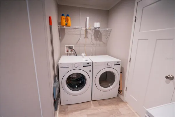 a view of a dinning table and chairs in the patio