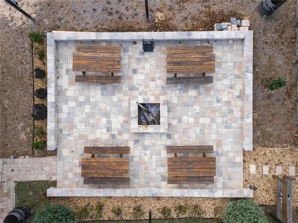 a view of a yard with trees