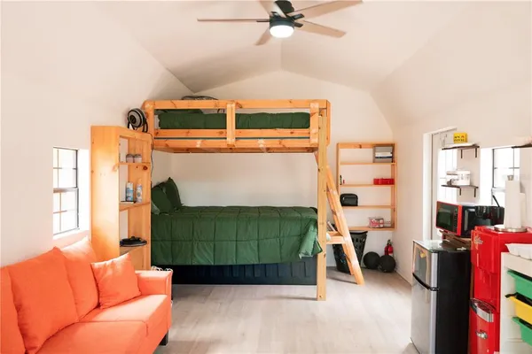 a view of swimming pool with trees in the background