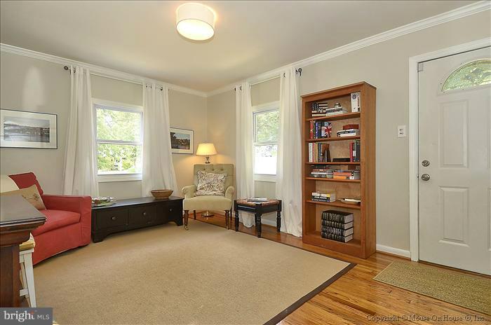 11708 Idlewood Road Silver Spring, MD 20906 - Photo 19 of 21 a living room with furniture and a window