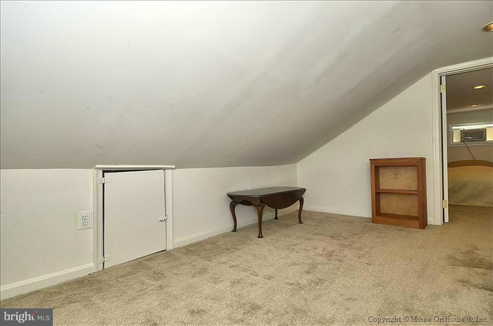 11708 Idlewood Road Silver Spring, MD 20906 - Photo 5 of 21 a view of an empty room and fire place
