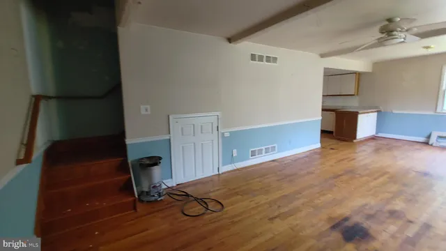 a view of a workspace with furniture