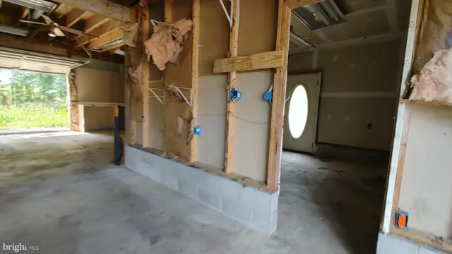 a view of a hallway with a window