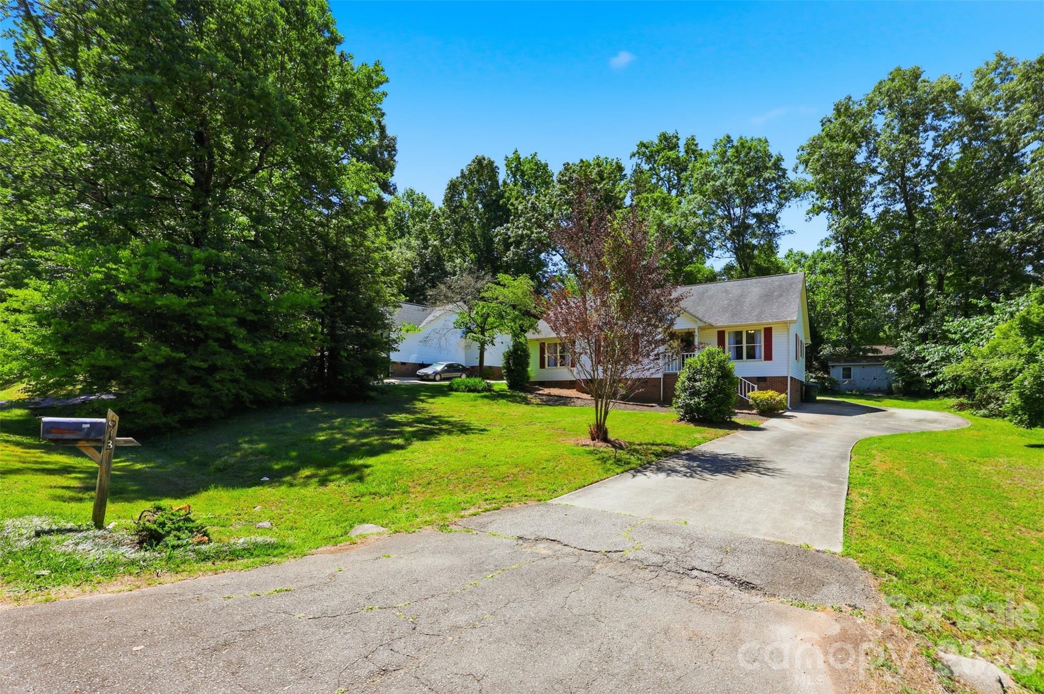 913 Pleasant Ridge Road Fort Mill, SC 29715 - Photo 21 of 40 a front view of a house with a yard and porch