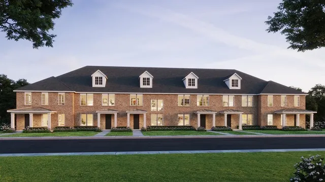 a view of building with yard